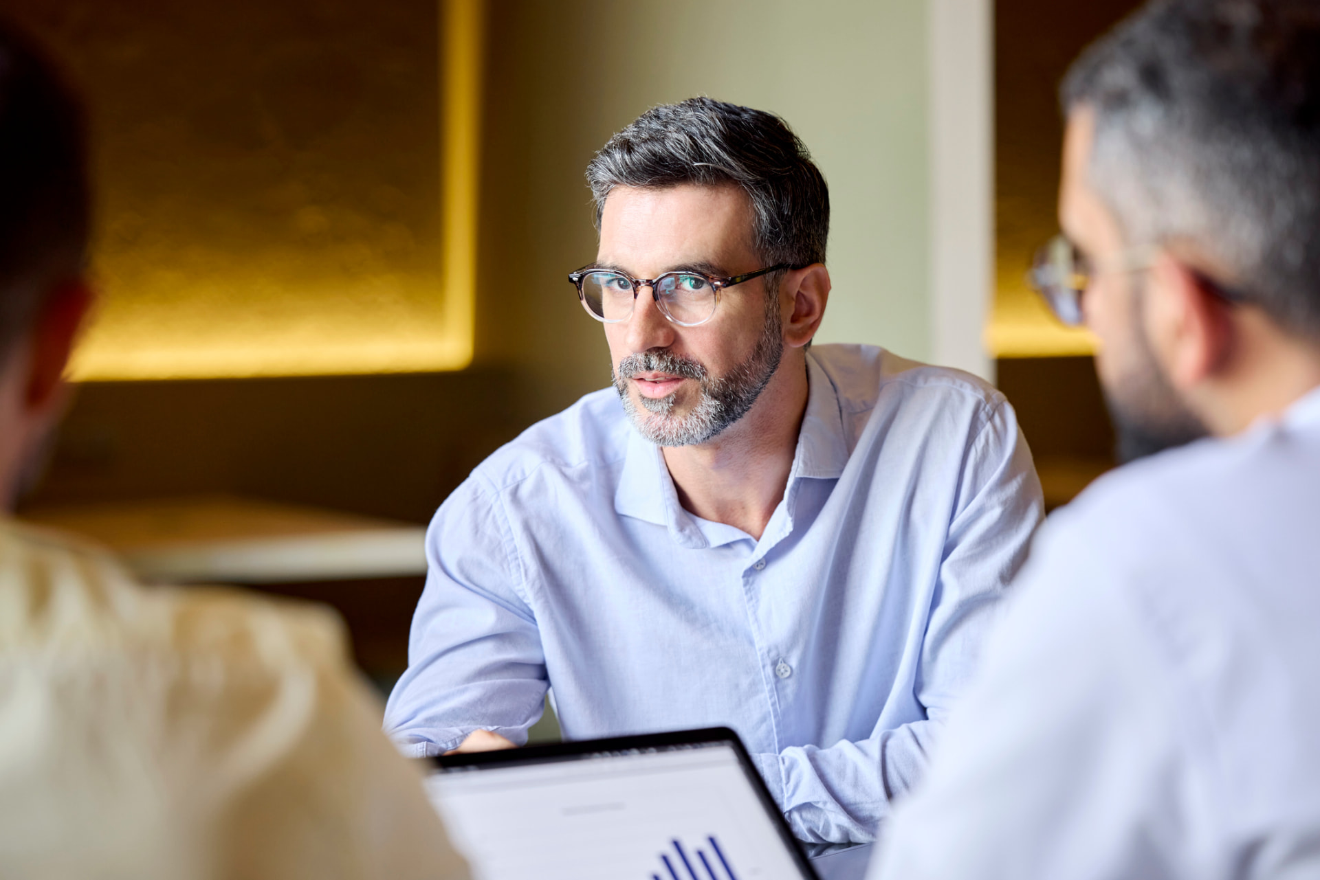 Tectona partners in a boardroom discussion
